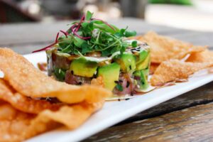 Fresh Ahi Tuna Stack on a plate with Wonton chips from The Wharf